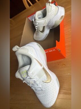 Nike Womens White and Gold Athletic Sneakers